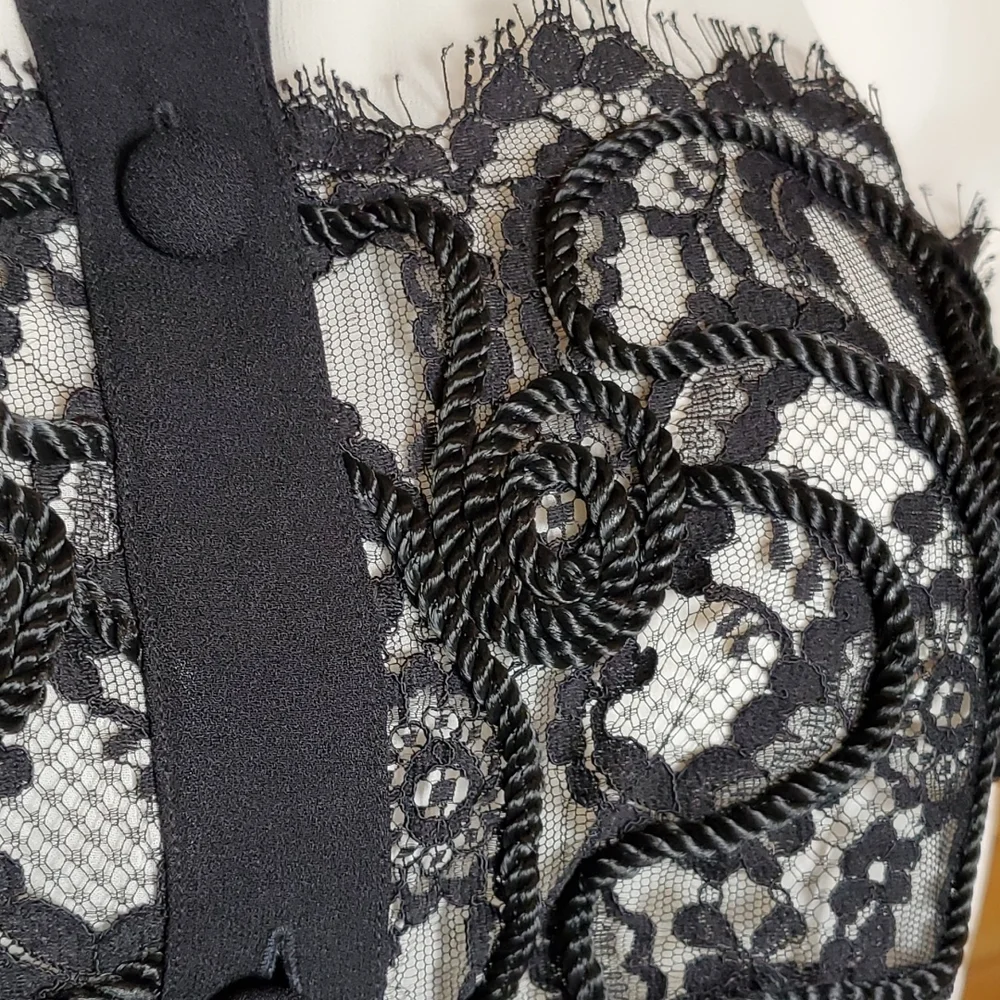 Beautiful ivory sheer blouse with decorative black lace. - Picture 6 of 7